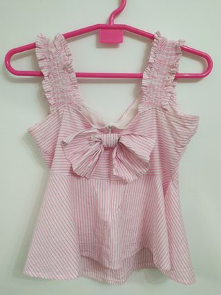 Blusa original a rayas con lazo trasero