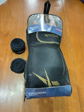 Guantes boxeo Reebok 14 oz oro/negro