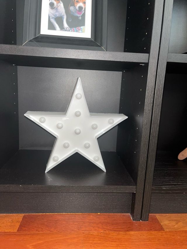 ornamento de estrela de luz quente