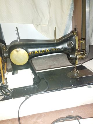 Máquina de coser antigua, ideal para decoración