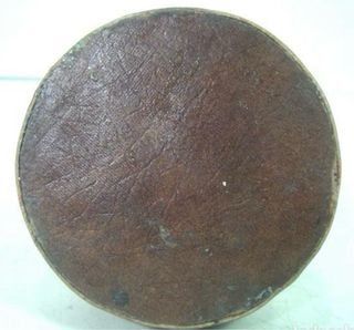 ANTIGUO YUNQUE JOYERO EN PIEL-BRONCE-TAS RELOJERO