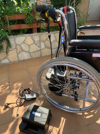 Motor auxiliar eléctrico para silla de ruedas