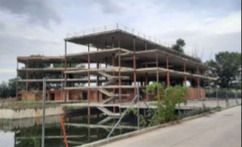 Parcela con edificio en construcción en Cabanillas