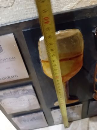 Collezionismo  quadro  con cavatappi  in ottone