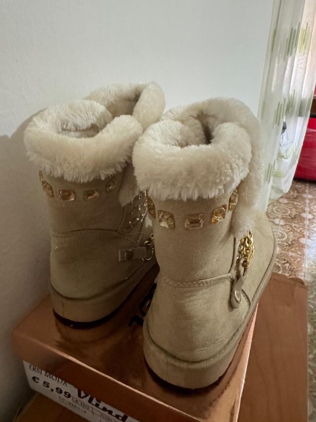 Stivali con pellicia interna