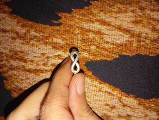 Anillo símbolo infinito