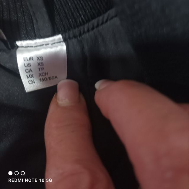 Piumino unisex  taglia xs ma va bene anche m