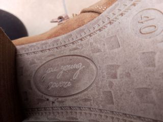 Stivaletti marroni Coveri You Young 40 con frange