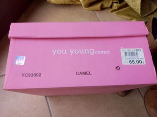 Stivaletti marroni Coveri You Young 40 con frange