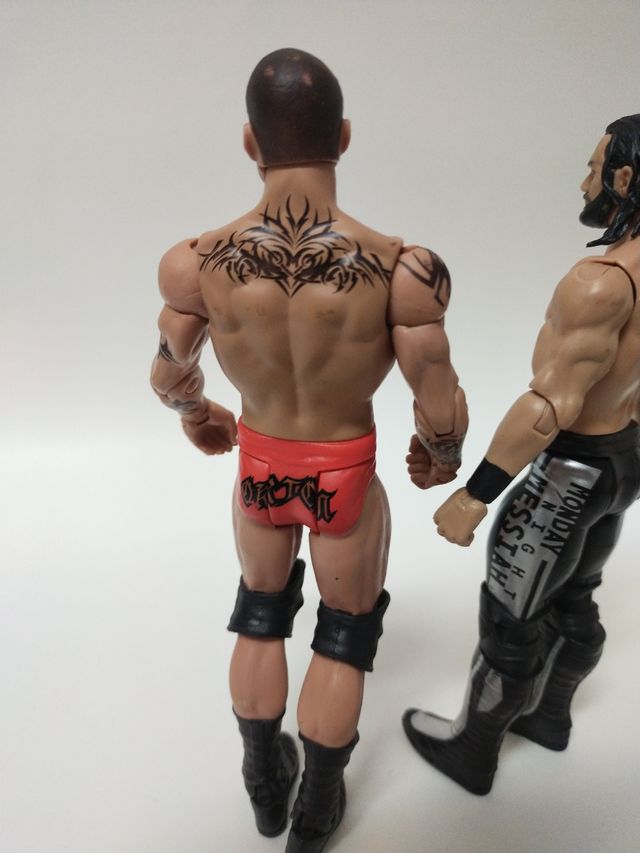 Wwe lotto action figure Orton rollins