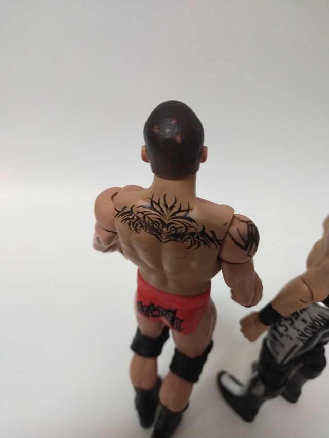 Wwe lotto action figure Orton rollins