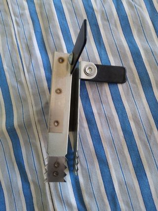 Pinça per a bloquejar persianes