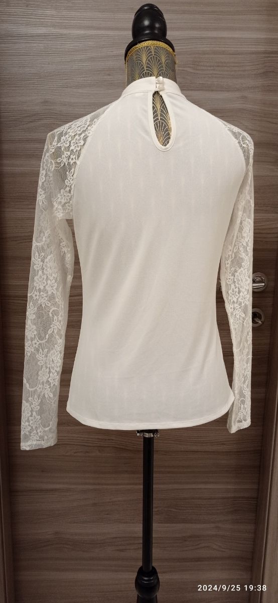 Blusa con pizzo