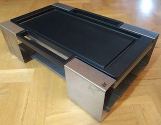 Parilla portatil WMF nueva con fogon gas rellenabl