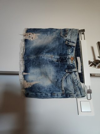 Minifalda denim elástico con detalles encaje
