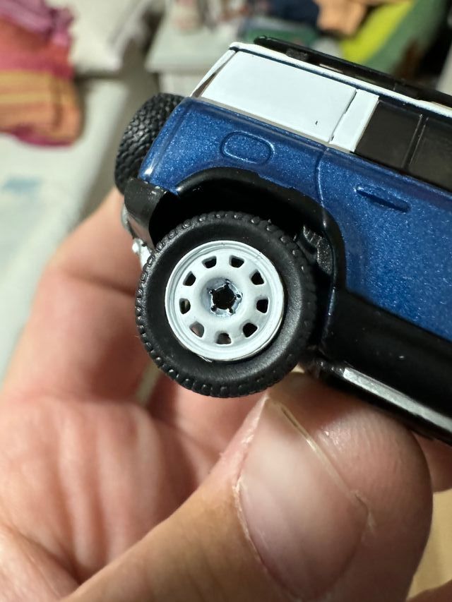 Alcatrão Land Rover Defender 110 azul