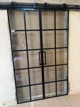 Puerta hierro y vidrio corredera