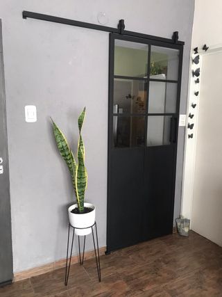 PUERTA CORREDERA ESTILO GRANERO VIDRIOS REPARTIDOS