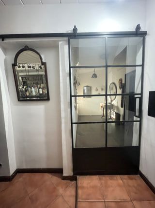 PUERTA CORREDERA ESTILO GRANERO VIDRIOS REPARTIDOS