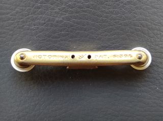 Antiguo sujeta cuellos en metal y nácar 1900