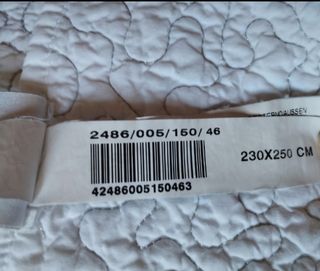 Edredón blancon con hilo plateado