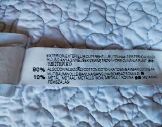 Edredón blancon con hilo plateado