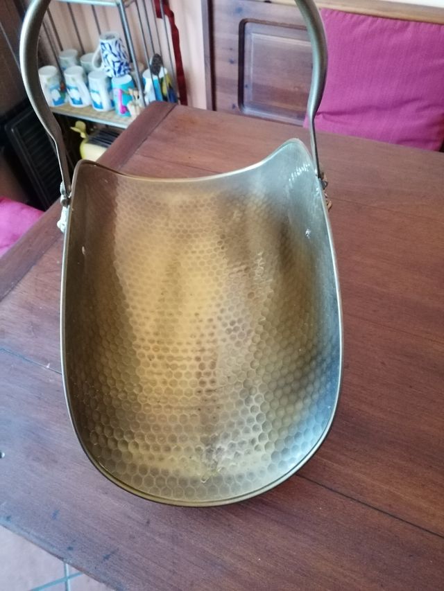 Portagiornali o portalegna in ottone