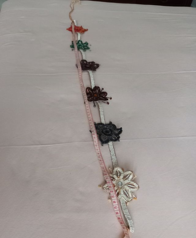 Cintura Maliparmi in pelle e perline