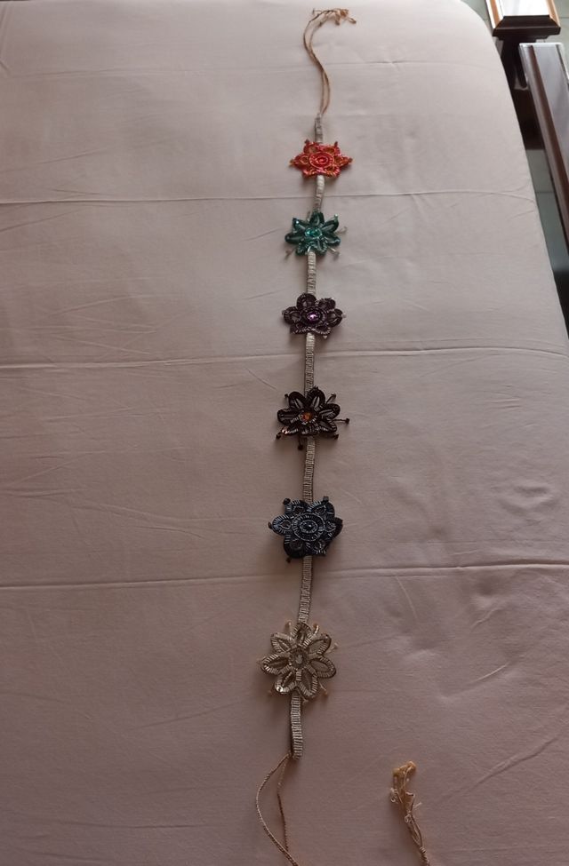 Cintura Maliparmi in pelle e perline