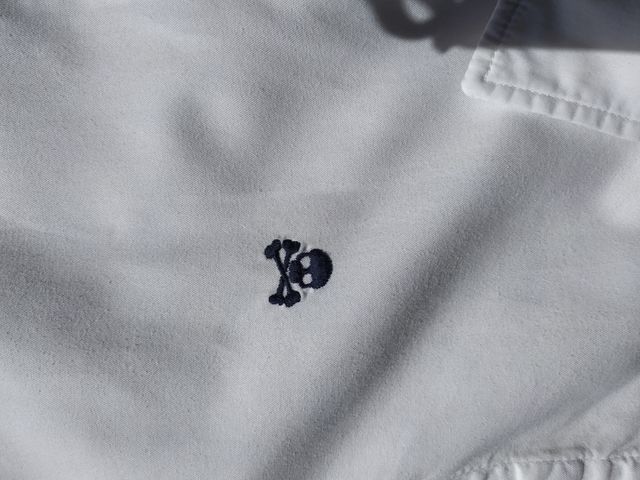 Camisa blanca Scalpers