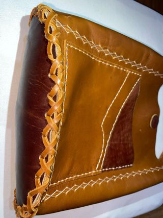 Bolso 100% en cuero, en variedad de tonos marrones
