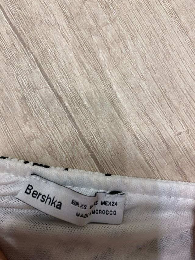 Top corto de tirantes