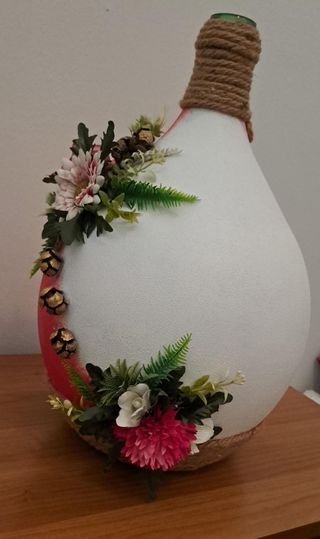 Damigiana di vetro decorata a mano