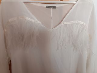 Blusa con seda y plumas de Dixie
