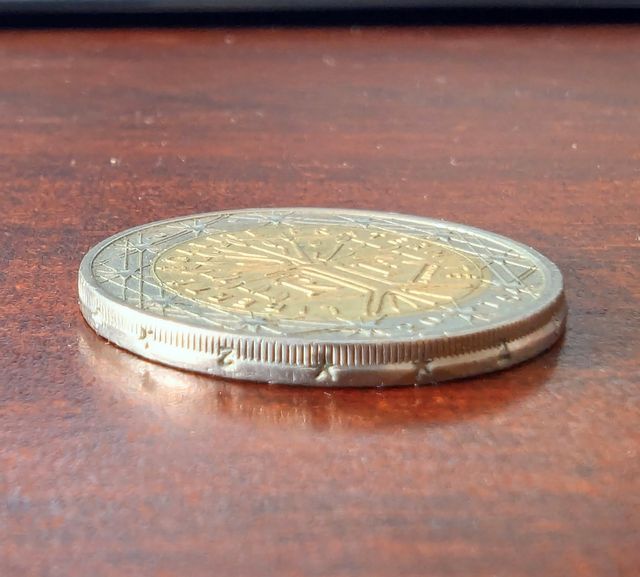 Moneda error acuñación canto