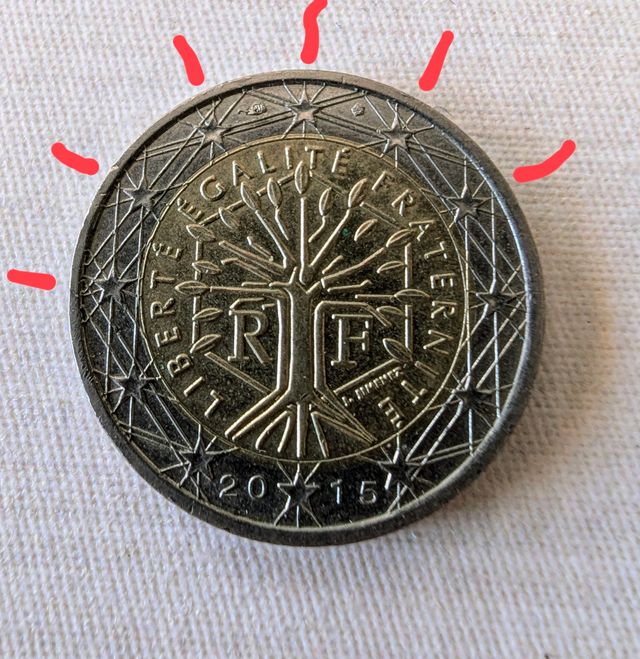 Moneda error acuñación canto