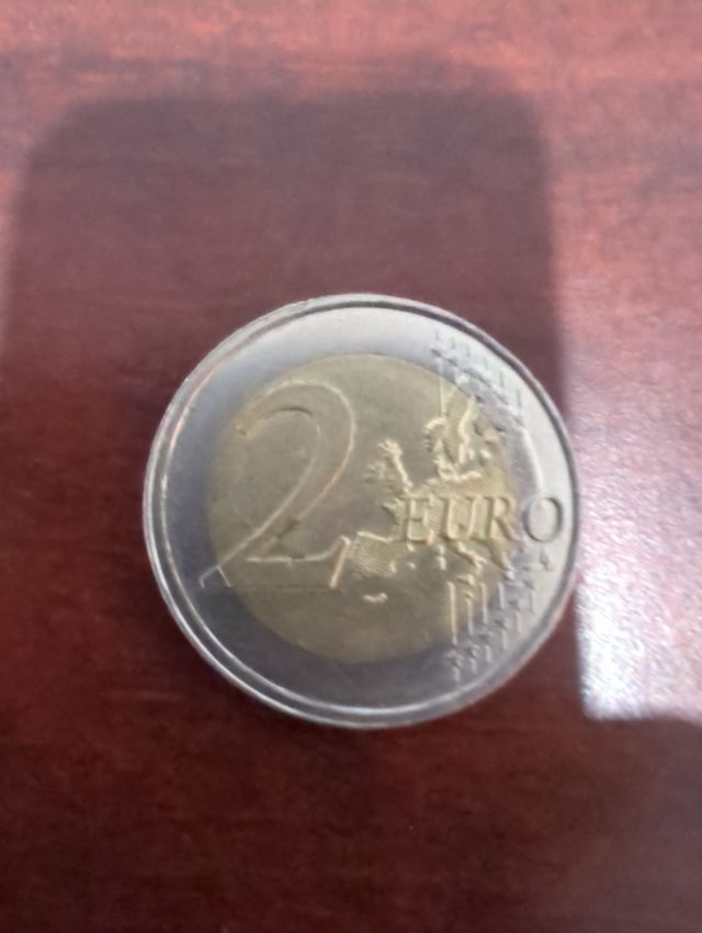 Moneda error acuñación canto