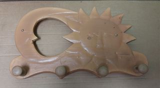 Perchero sol madera.