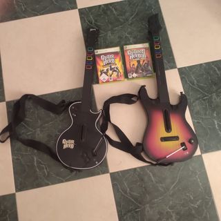 Guitarra xbox + juegos de Guitar Hero