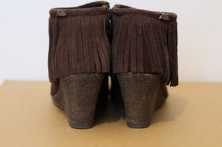 Botines con flecos de XTI