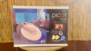 REPRODUCTOR DVD PORTATIL (SONY) + 2 PELÍCULAS