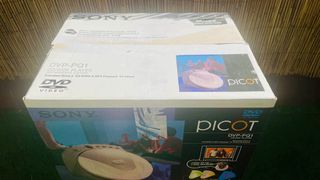 REPRODUCTOR DVD PORTATIL (SONY) + 2 PELÍCULAS