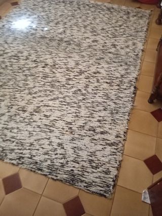 Alfombra antigua queda muy bonita