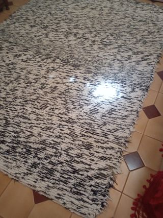 Alfombra antigua queda muy bonita