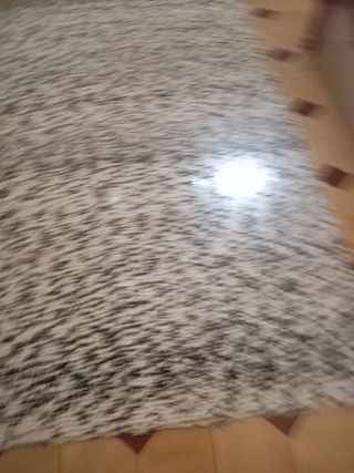 Alfombra antigua queda muy bonita