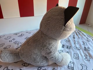 Perro de peluche ojos brillantes ,