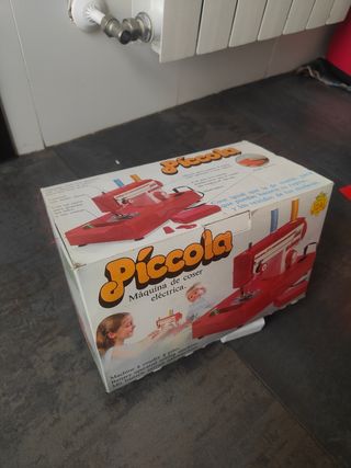 Juguete maquina de coser