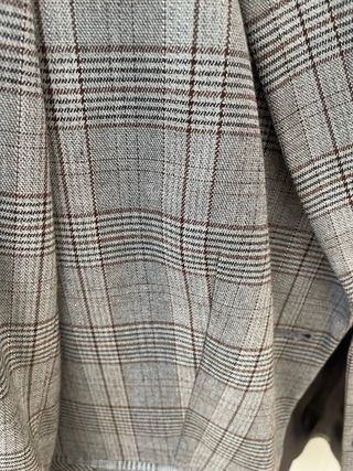 Americana de gris con hilo plata