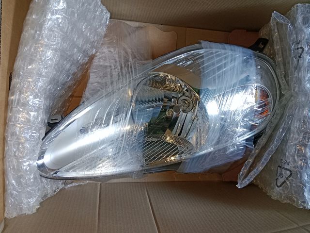 Faro delantero izdo Fiat grande punto