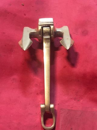 Ancla Titanic bronce.